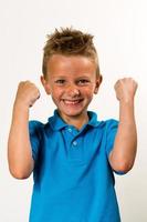 Boy celebrating success photo