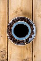 Coffee cup on the wooden table photo
