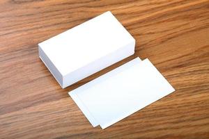 blank business cards on a wooden background photo