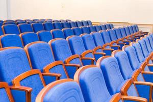 Conference hall with blue seats photo
