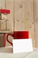 blanck business card, gift box and red coffee cup photo
