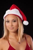 Blond woman in Santa hat