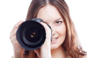 smiling woman with professional camera