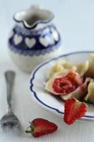 dumplings with strawberries photo