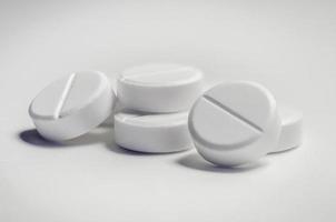 Heap of white  medicine  antibiotic pills