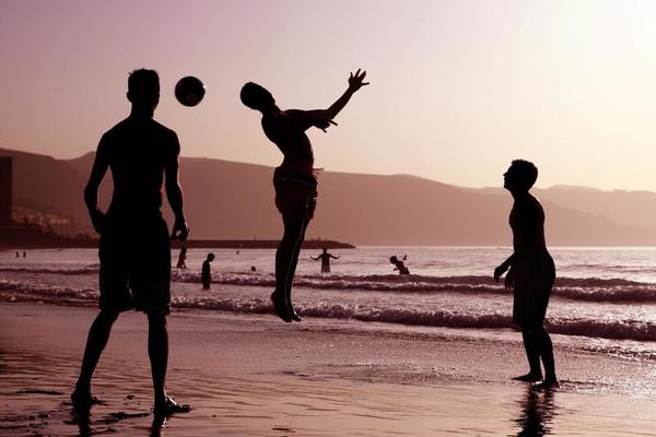 Beach Football Stock Photos, Images and Backgrounds for Free Download