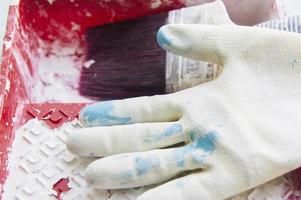 tarea cepillo blanco pintura guantes azul claro foto