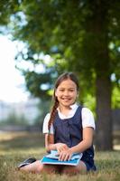 Schoolgirl in park