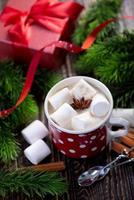 Hot drink with marshmallows photo