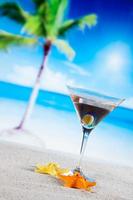Tropical drinks on beach photo