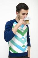 Teenager drinking coffee photo