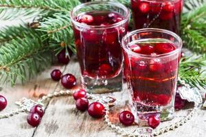 Cranberry drink on Christmas background photo