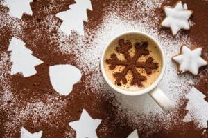Hot drink with cocoa snowflake photo