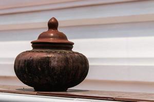 Clay pot on drinking water photo