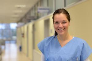 Nurse in hospital smiling photo