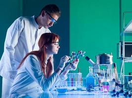 scientists studying a molecular structure photo