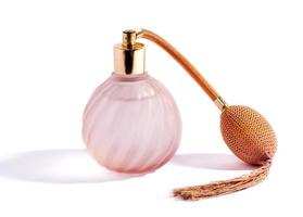 Swirling pink perfume bottle and atomizer