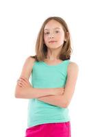 Cheerful girl with arms crossed photo