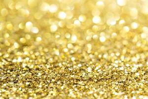 Gold abstract glitter background with copy space photo
