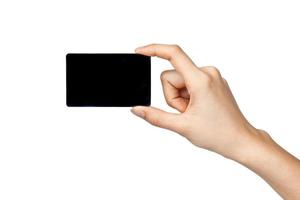 black card in hand on white background photo