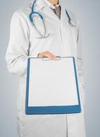 Doctor with clipboard, copyspace