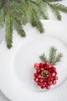 Christmas white plate. Top view with copy space. photo