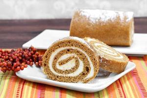 Pumpkin roll cake, selective focus and copy space.