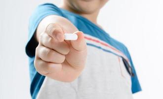 Boy and medicine tablet
