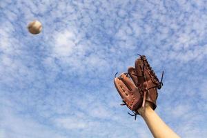 hand in baseball glove and ready to  catching the ball photo