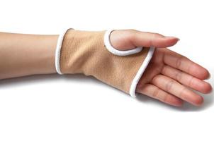 Close-up hand splint for broken bone treatment isolated on white
