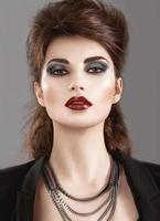 Beautiful Girl in the Gothic style with bright makeup. Beauty