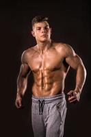 bodybuilder man, low key photo