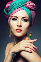 Beautiful lady with colored turban photo