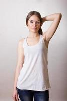 Portrait of a beautiful young woman in a white T-shirt