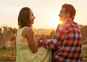 Young couple in love outdoor photo