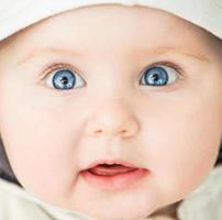 closeup portrait of beautiful baby photo