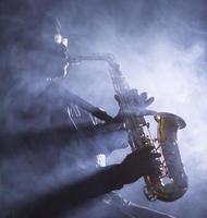 African jazz musician playing the saxophone photo
