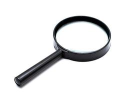 Magnifying glass on white background photo