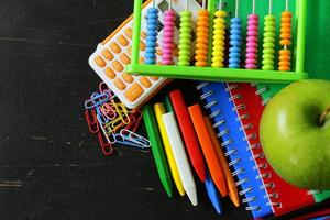 Back to school concept, school stationery multicolored pencils and notebooks photo