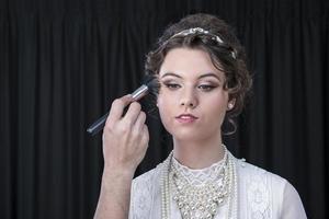 Neo-Victorian model being made up photo
