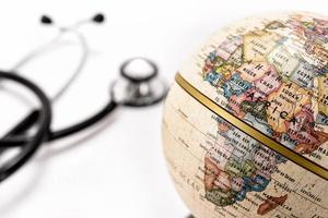 Globe (Africa) and stethoscope photo
