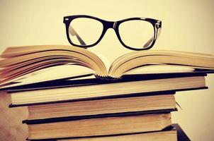 books and eyeglasses