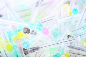 Background from multicolored medical needles. photo