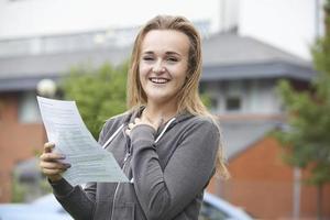 Teenage Girl Happy With Good Exam Results photo