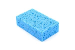 blue sponge isolated on white background photo