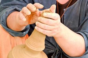 hands making earthenware