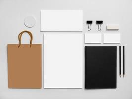 Branding mockup with shopping bag. Stationery on gray photo