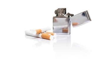 Cigarettes and lighter photo