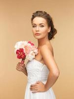 woman with bouquet of flowers photo