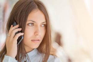 Young woman talking on the phone. photo